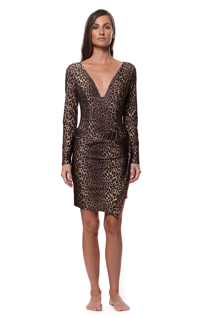 Bella Paradise animal print skirt for vacation worn as part of a long sleeve deep V-neck dress