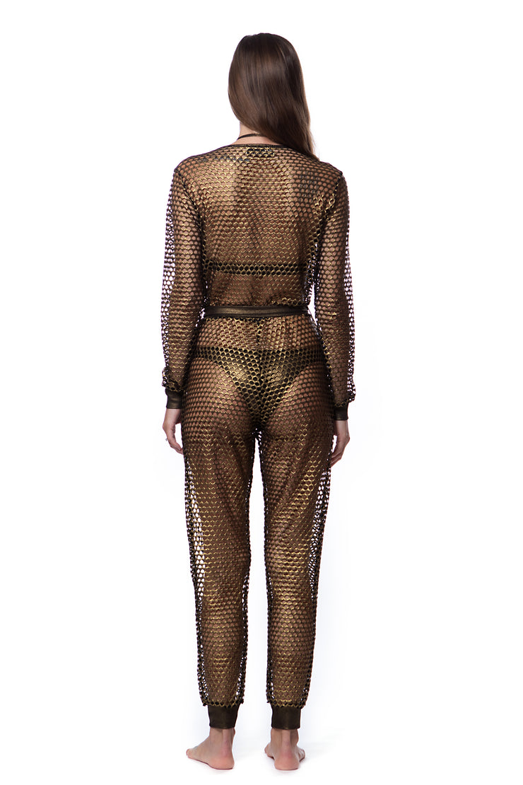 Back view of a model wearing a metallic mesh jumpsuit for women by Bella Paradise in a color print size
