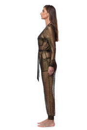 Side view of woman wearing metallic mesh jumpsuit for women by Bella Paradise in color print size