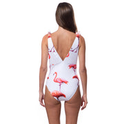 Back view of a high tied flamingo print swimsuit by Bella Paradise with pink flamingo design on white