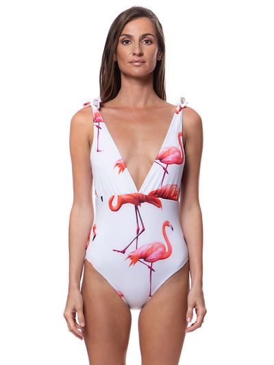 Bella Paradise high tied flamingo print swimsuit with deep V-neck and shoulder ties on female model