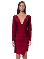 Woman wearing a red luxury resort skirt dress with long sleeve swimsuit with deep V neckline by Bella Paradise