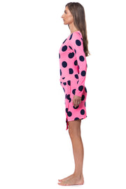Bella Paradise luxury resort wear skirt in pink with large black polka dots on a female model