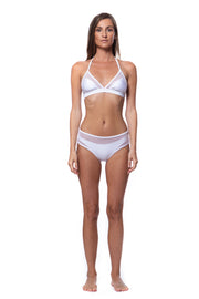 Luxury white bikini top for women worn by model with matching white bikini bottom from Bella Paradise