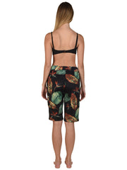Bella Paradise color print size luxury women's board shorts with tropical leaf pattern from back view
