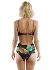 Back view of woman wearing Bella Paradise high waist bikini bottom with tropical color print