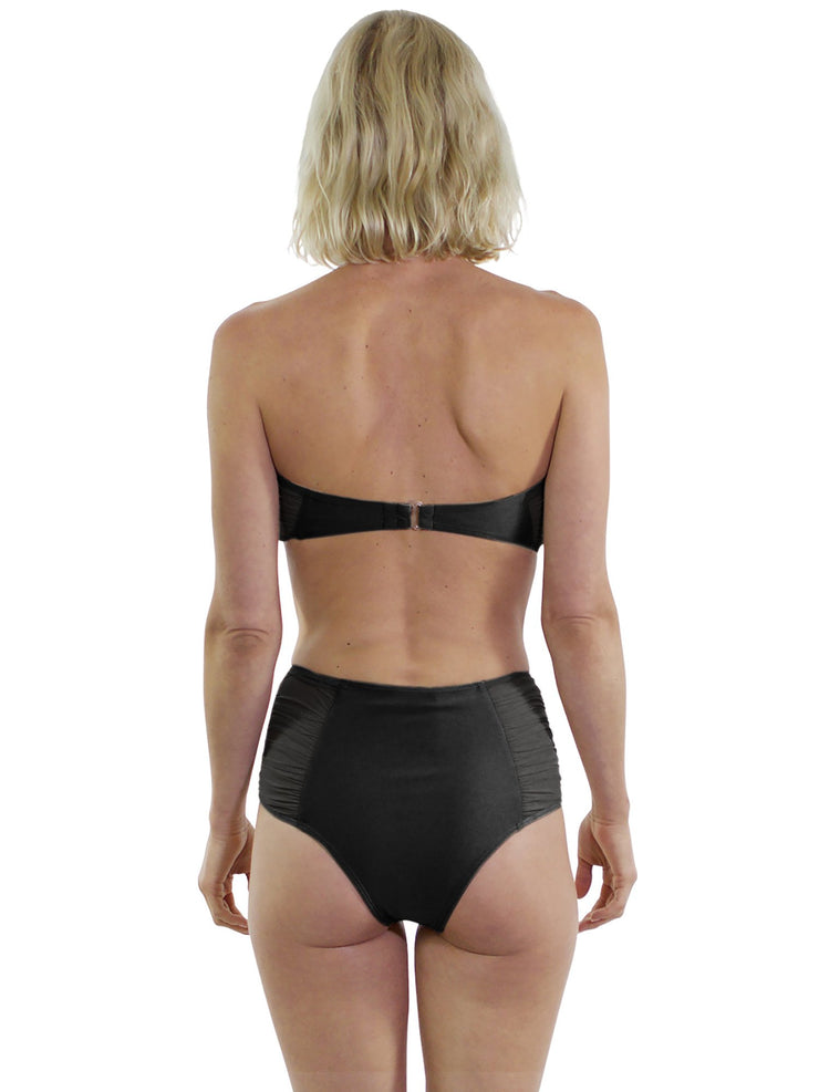 Back view of woman wearing black sheer bandeau bikini top and high-waisted bottom by Bella Paradise