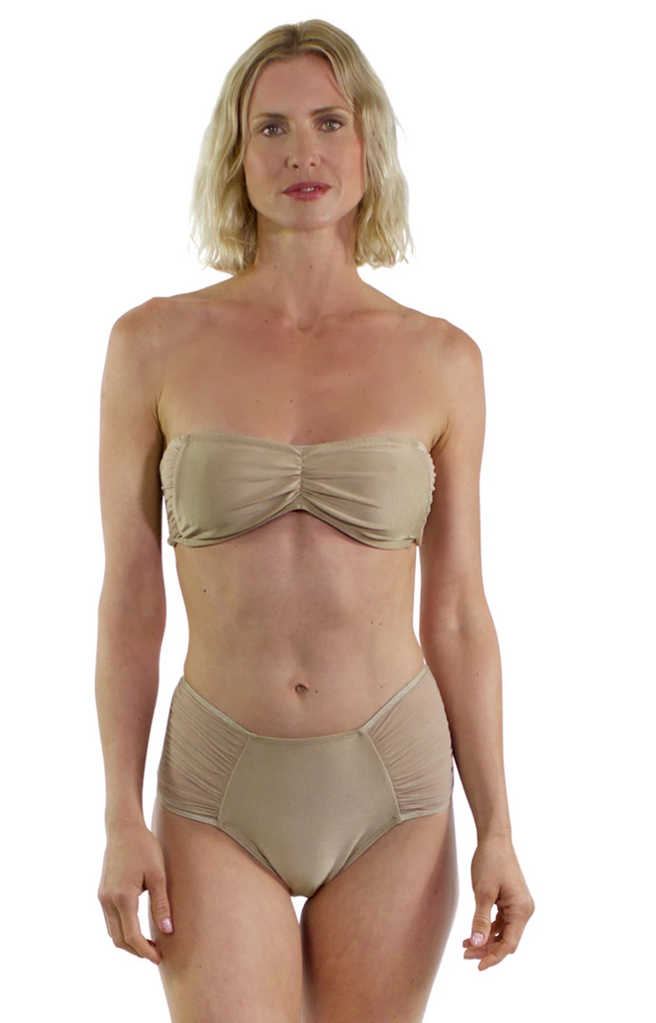 Bella Paradise sheer bandeau bikini top in beige with high-waisted bottoms modeled by a woman