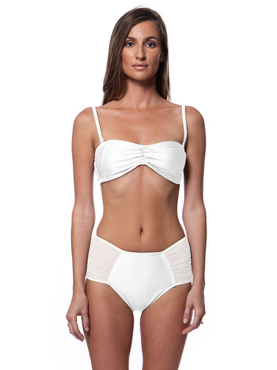 Bella Paradise sheer bandeau bikini top in white with matching high-waisted bottoms on model