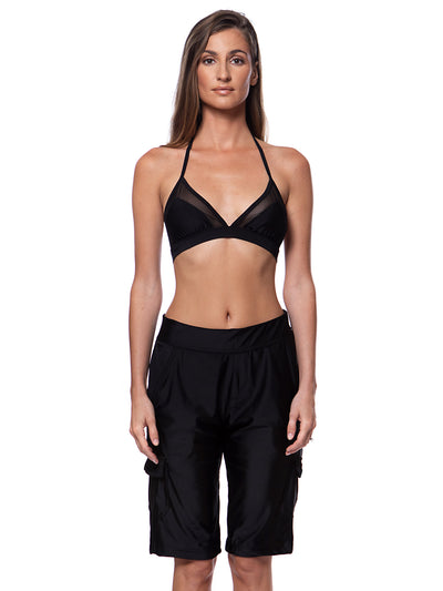 Bella Paradise women's board shorts in black color print size worn by model with black halter bikini top