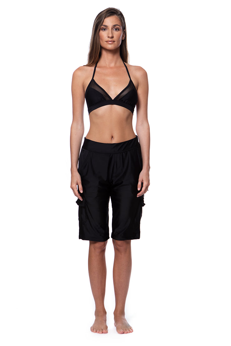 Bella Paradise women's board shorts in black with a relaxed fit and side pockets