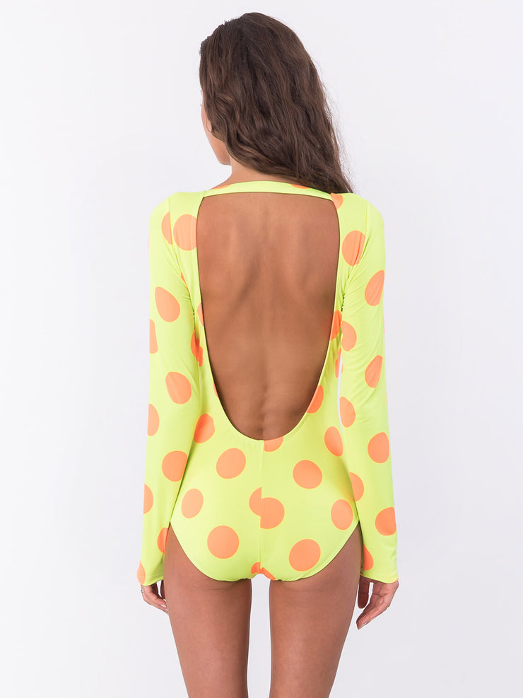 Back view of yellow polka dot one Piece bathing suit with long sleeves and open back by Bella Paradise